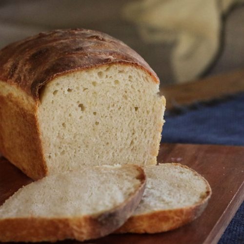 Country sourdough sandwich bread cooling for the slicer.